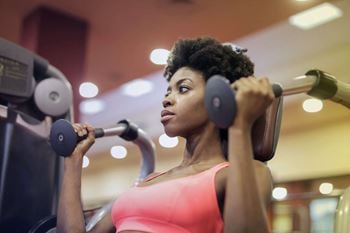 woman in fitness center, Legacy Pointe at Poindexter, Columbus, OH